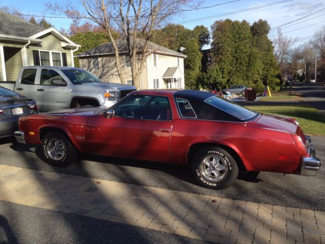 1976 Firethorn red Oldsmobile Cutlass Coupe