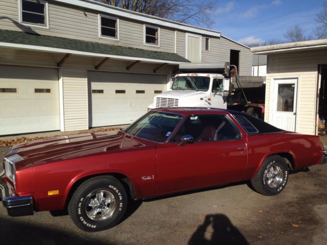 1976 Firethorn red Oldsmobile Cutlass Coupe