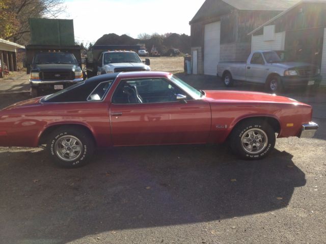 1976 Firethorn red Oldsmobile Cutlass Coupe