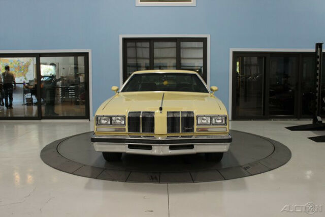 1976 Yellow Oldsmobile Cutlass