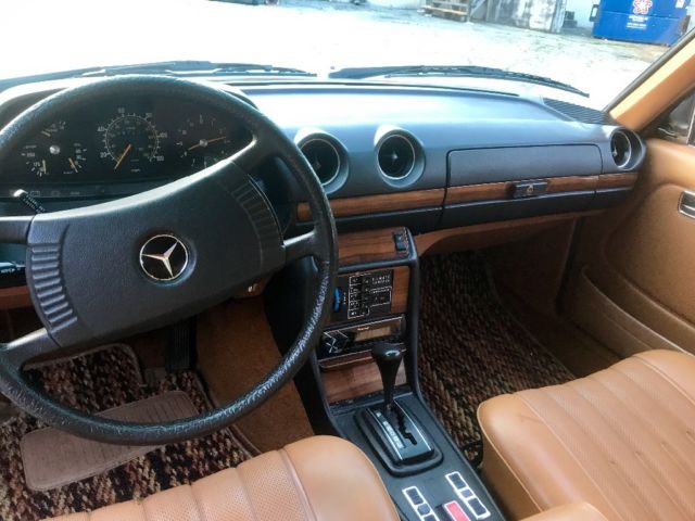 1977 White Mercedes-Benz 300-Series Sedan