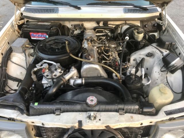 1977 White Mercedes-Benz 300-Series Sedan