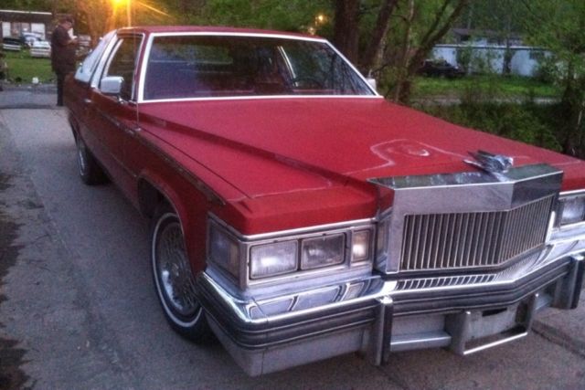 1977 Red Cadillac DeVille 2 door coupe