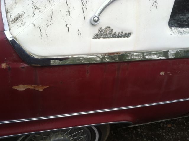 1977 Red Cadillac DeVille 2 door coupe