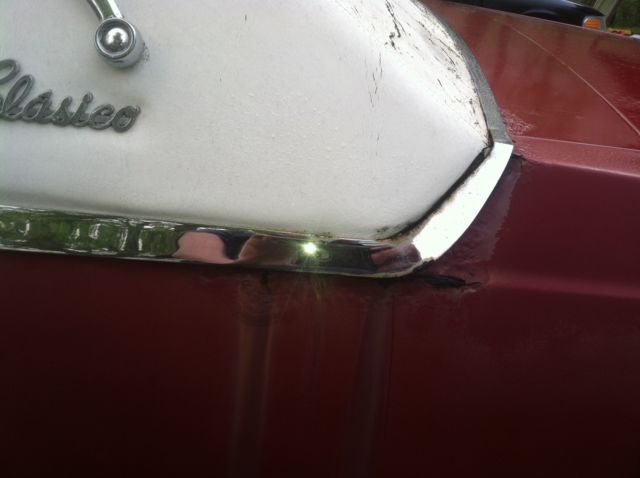 1977 Red Cadillac DeVille 2 door coupe