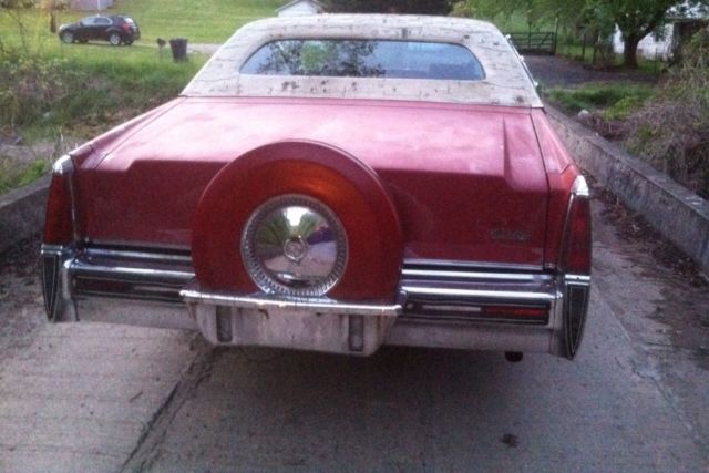 1977 Red Cadillac DeVille 2 door coupe