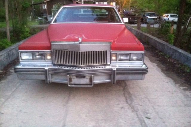 1977 Red Cadillac DeVille 2 door coupe