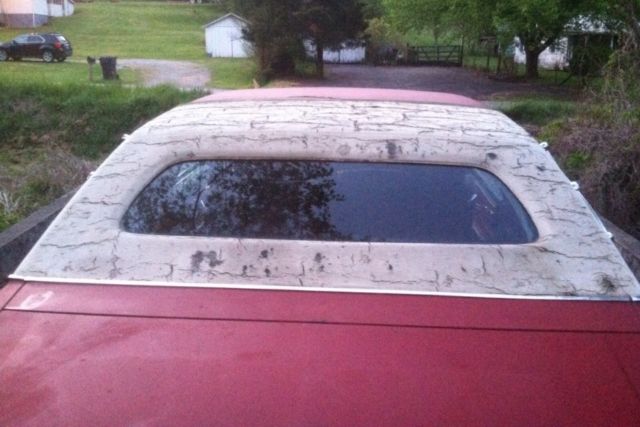 1977 Red Cadillac DeVille 2 door coupe