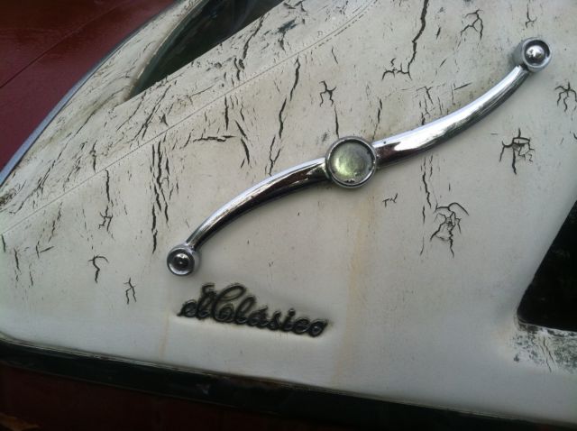 1977 Red Cadillac DeVille 2 door coupe