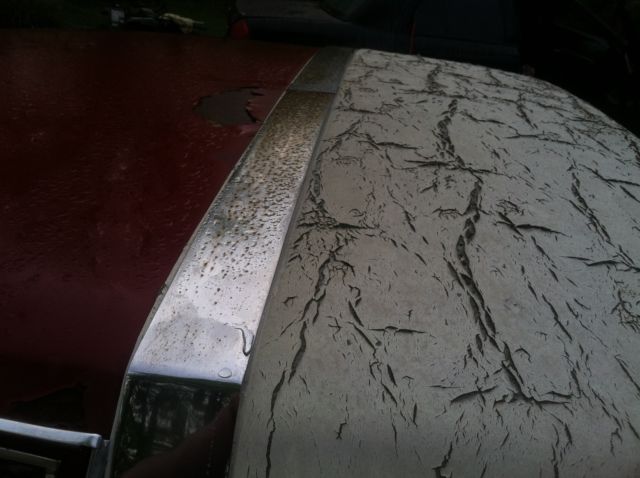 1977 Red Cadillac DeVille 2 door coupe