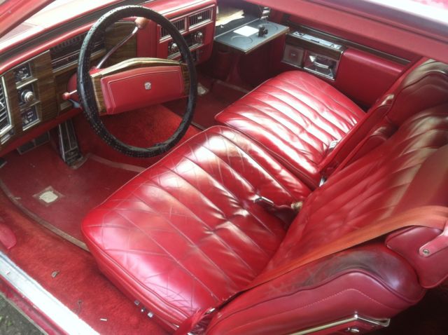 1977 Red Cadillac DeVille 2 door coupe