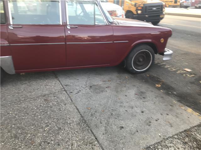 1977 maroon Chevrolet Bel Air/150/210 sedan