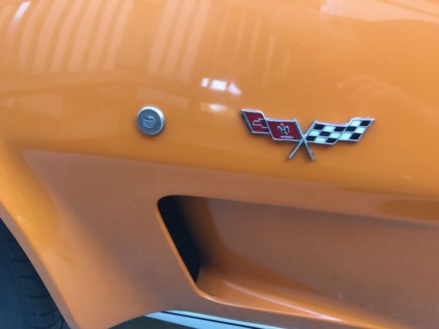 1977 Orange Chevrolet Corvette Coupe