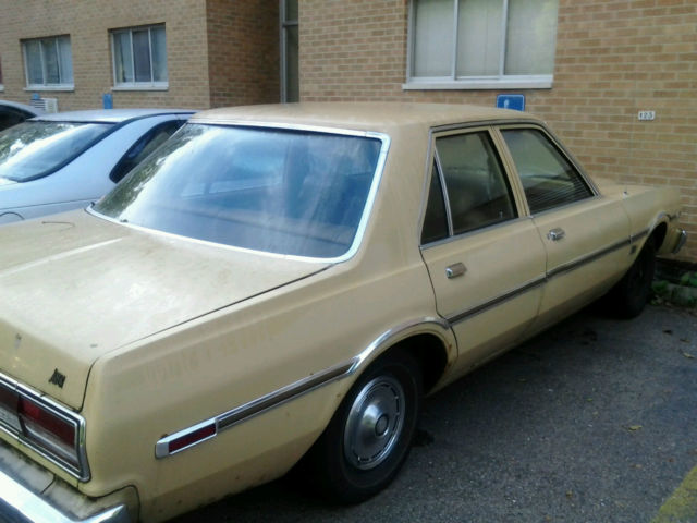 1977 cream yellow Chrysler Aspen Sedan