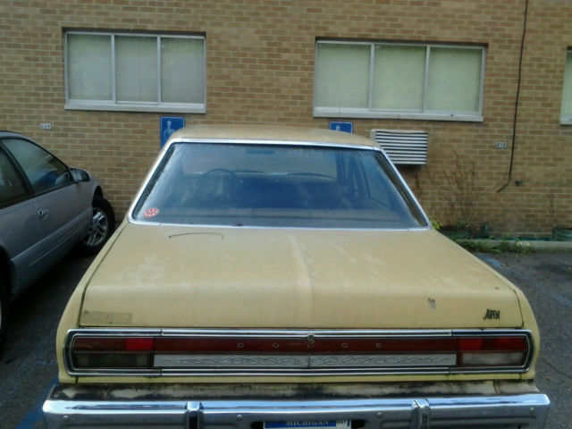 1977 cream yellow Chrysler Aspen Sedan