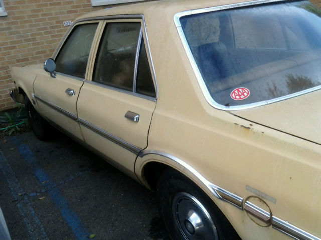 1977 cream yellow Chrysler Aspen Sedan