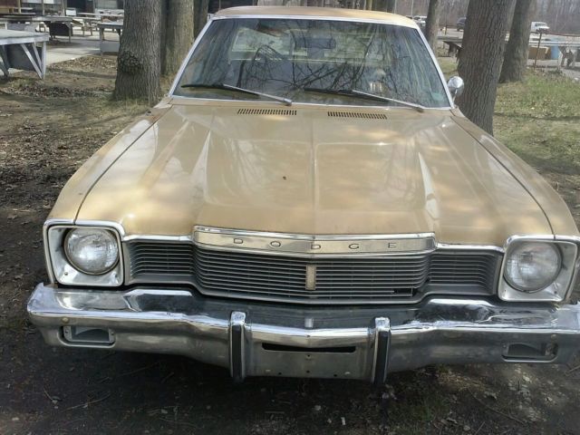 1977 cream yellow Chrysler Aspen Sedan