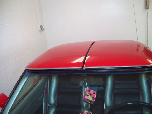 1977 Red Chevrolet Corvette T-Top Coupe