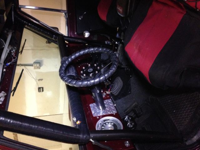 1977 Marroon metallic Ford Bronco Wagon