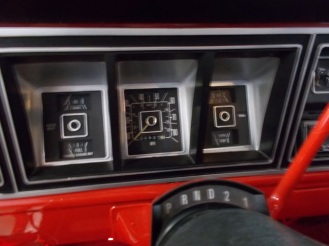 1977 red Ford F-250 pickup