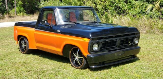 1977 black / orange Ford F-100