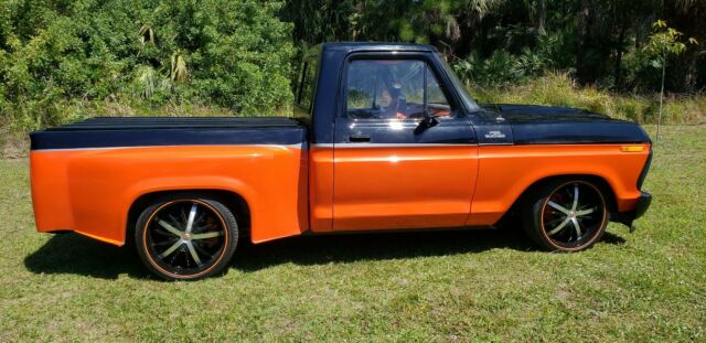 1977 black / orange Ford F-100