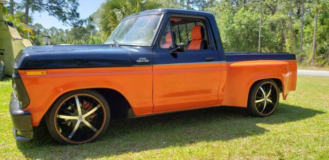 1977 black / orange Ford F-100
