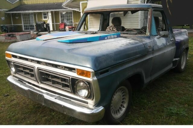 1977 black / orange Ford F-100