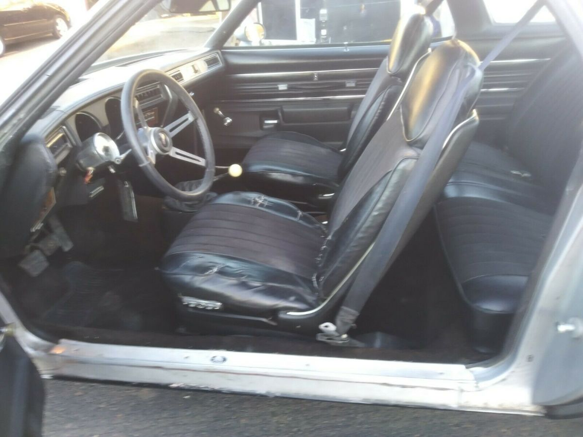 1977 Silver Oldsmobile Cutlass Coupe