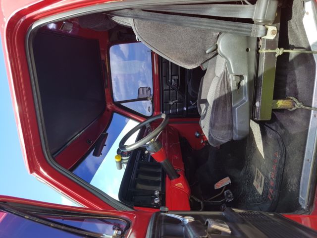 1977 Red Ford F-250 Standard Cab Pickup