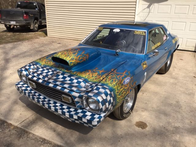 1977 Blue Ford Mustang --