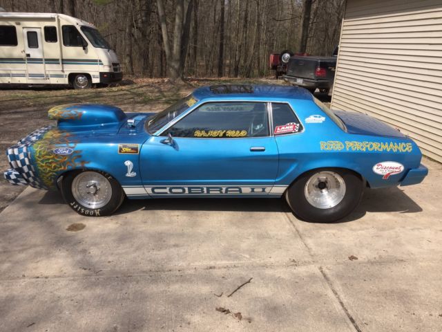 1977 Blue Ford Mustang --