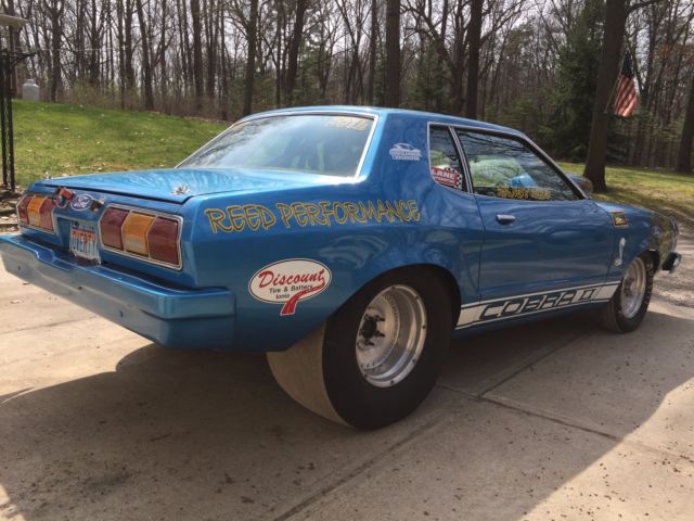 1977 Blue Ford Mustang --