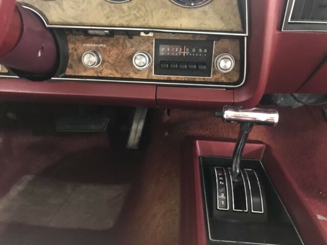 1977 Red Ford Thunderbird Sedan