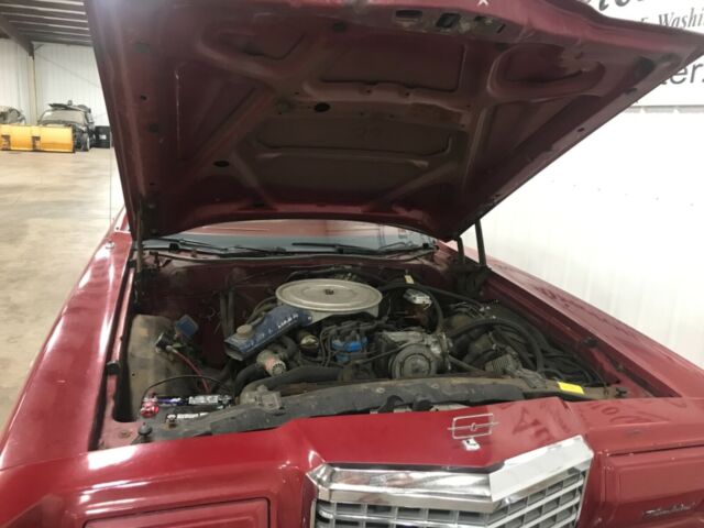 1977 Red Ford Thunderbird Sedan