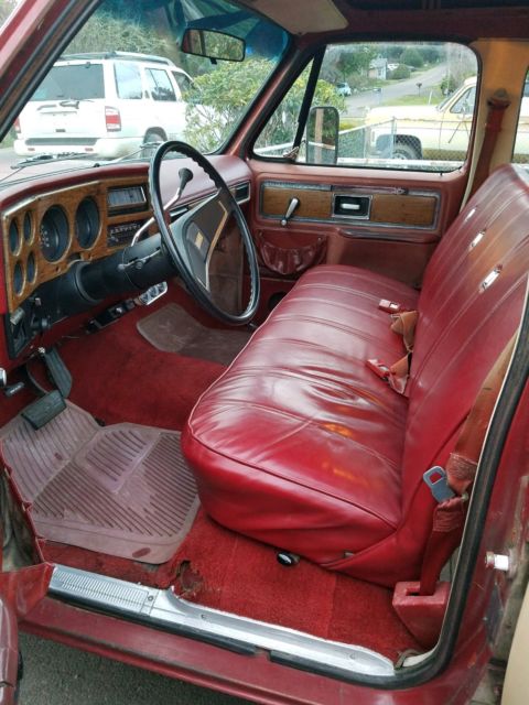 1977 Burgundy GMC Suburban SUV