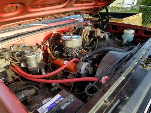 1977 Burgundy GMC Suburban SUV