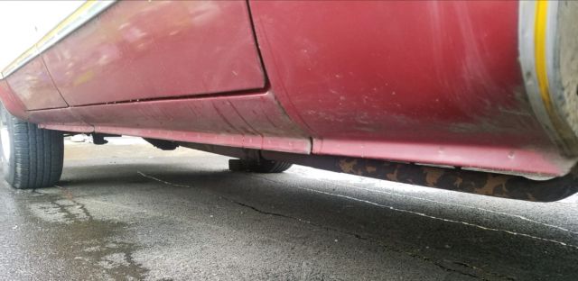 1977 Burgundy GMC Suburban SUV