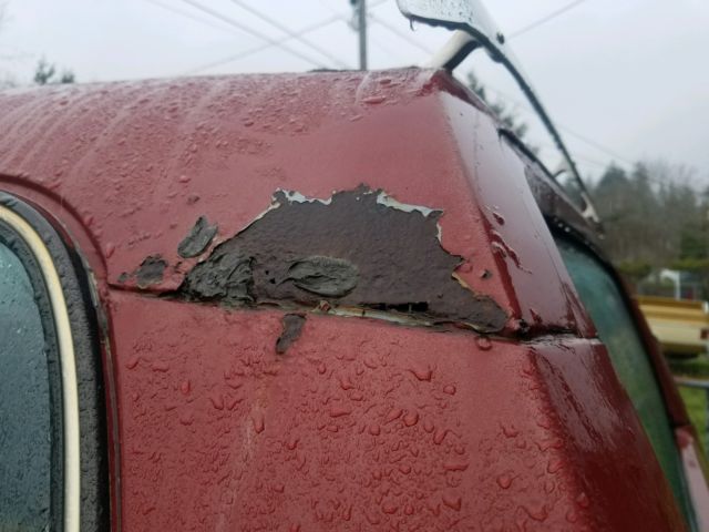 1977 Burgundy GMC Suburban SUV