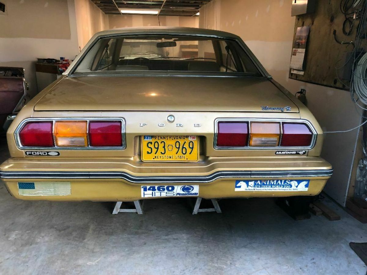 1977 gold Ford Mustang Coupe