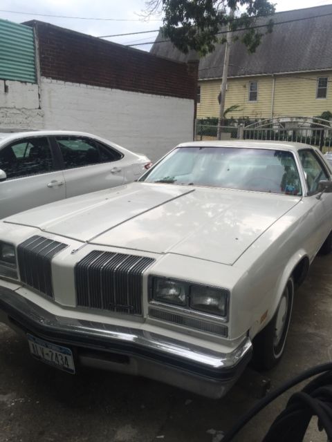 1977 BLACK CHERRY Oldsmobile Cutlass Coupe