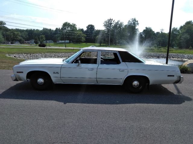 1977 White Plymouth Gran Fury Sedan