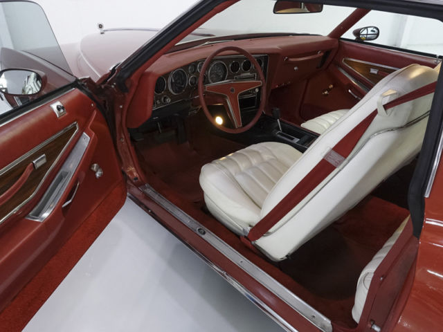 1977 Firethorn Red Pontiac Grand Prix Coupe