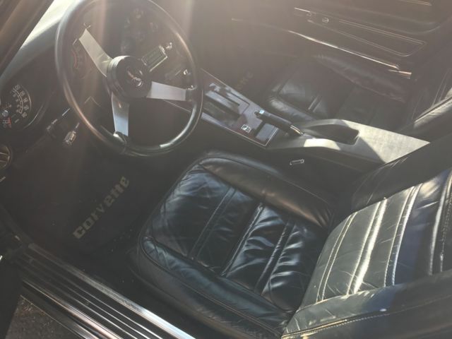 1977 Black Chevrolet Corvette T-top coupe