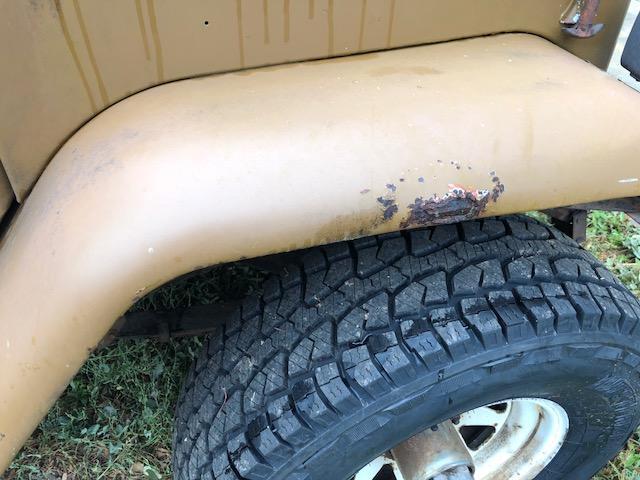 1978 brown Toyota FJ Cruiser SUV