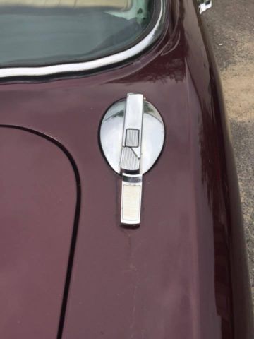 1978 Burgundy Jaguar XJ6 4Dr.