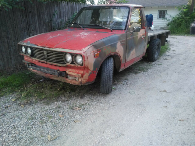 1978 Red Toyota Hilux Standard Cab Pickup