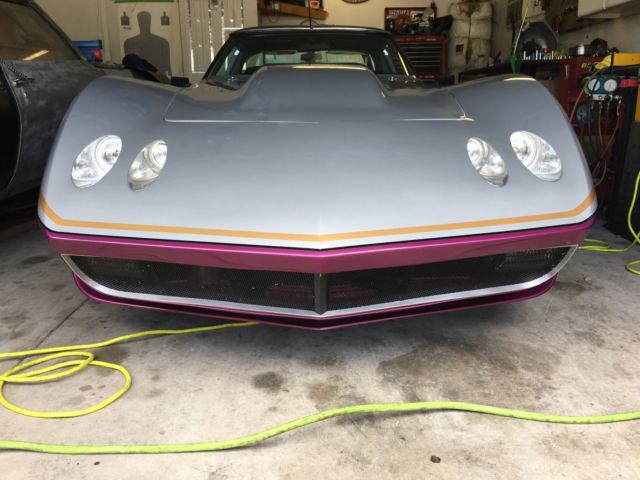 1979 Silver and purple Chevrolet Corvette Coupe