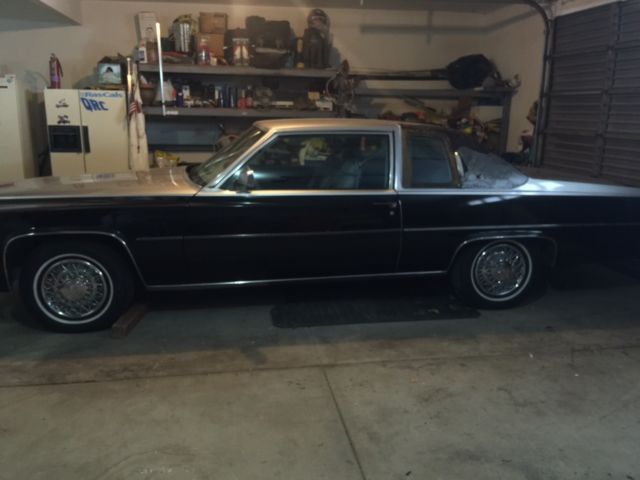 1979 black/silver Cadillac DeVille Coupe