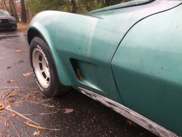 1979 greenish Chevrolet Corvette